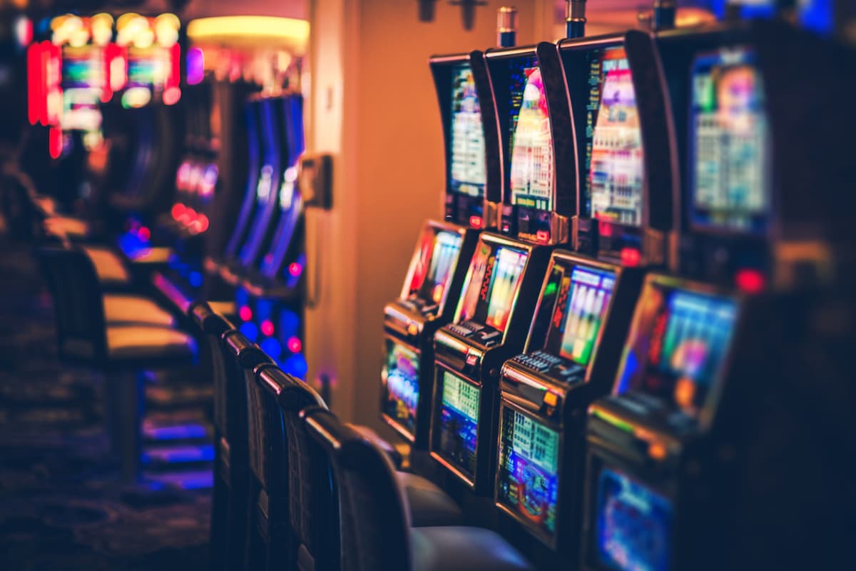 Row of slot machines in a casino.